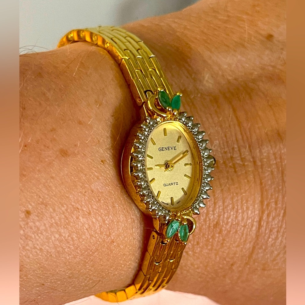 Gold watch with real emeralds & diamonds NWOT
